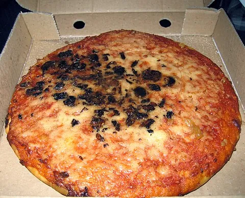 pizza crunch: a deep-fried pizza, a form of fast food in Scotland