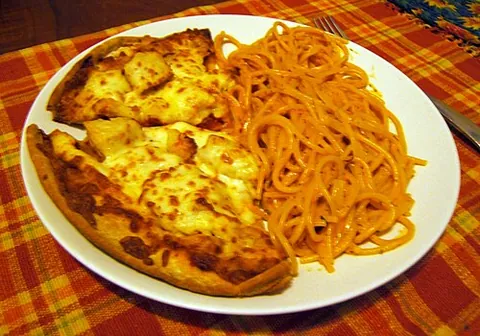 pizza-ghetti: a dish consisting of a slice of pizza and a serving of spaghetti
