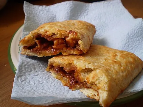 pizza pocket: a type of small calzone that may be baked or deep fried; a pizza dough bun stuffed with pizza...