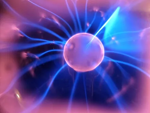 plasma: a state of matter consisting of partially ionized gas and electrons