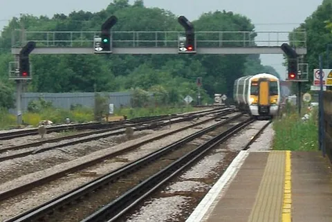 platform loop: a short stretch of railway line at a railway station which leaves a through line to serve a...