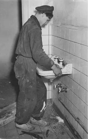 plumber: one who works in or with lead