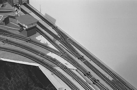 plywood pacific: a model railroad layout that lacks scenery, being mostly just trackwork on a bare plywood (or other...