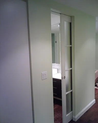 pocket door: a door that slides into the wall