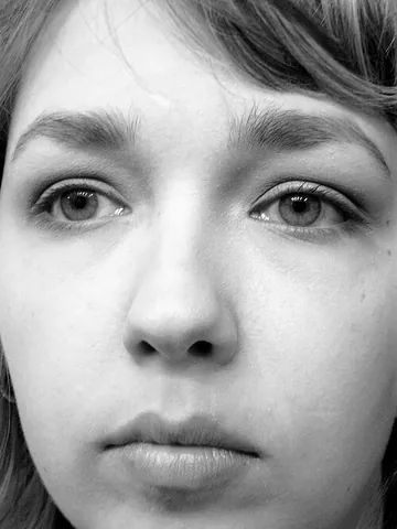 poker face: an impassive facial expression cultivated to prevent other players from determining whether one's...