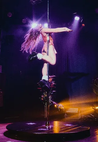 pole dance: a form of dancing and acrobatics centred on a pole, practiced as a gymnastic or erotic activity