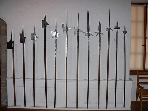 polearm: a close-quarter combat weapon with the main fighting part of the weapon placed on the end of a long...