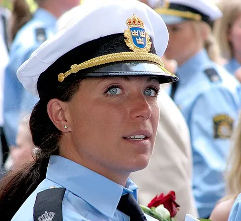 policewoman: a female police officer