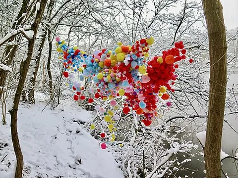 pompom: a ball made of pieces of soft fabric, tinsel, plastic, or paper streamers, tied together in the...
