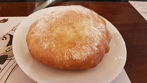 ponchik: a type of fried dough pastry popular in many Central Asian and Eastern European countries, made by...