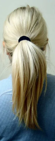 ponytail: a hairstyle where the hair is pulled back and tied into a single "tail" which hangs down behind the...