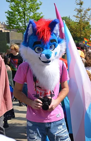 poodling: the act or an instance of wearing a partial fursuit while showing one's skin