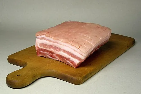 pork belly: a boneless cut of fatty meat from the belly of a pig