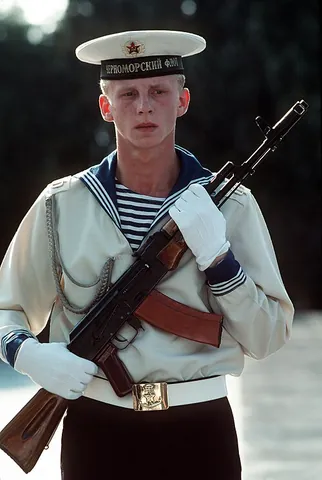 port arms: the position of a weapon carried diagonally in front of the body
