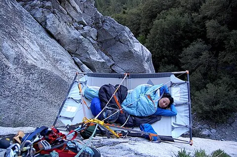 portaledge: a portable tent system used by rock climbers to sleep in during a climb lasting multiple days