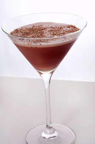 porto flip: a cocktail made from brandy, port wine, and egg yolk