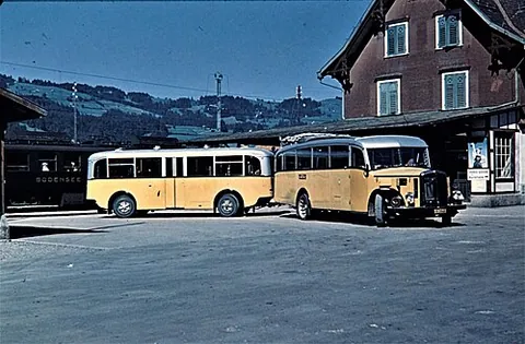 postbus: a mail delivery vehicle that also serves as a bus for passengers, typically in areas with limited...