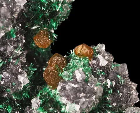 powellite: a tetragonal-dipyramidal mineral containing calcium, molybdenum, and oxygen