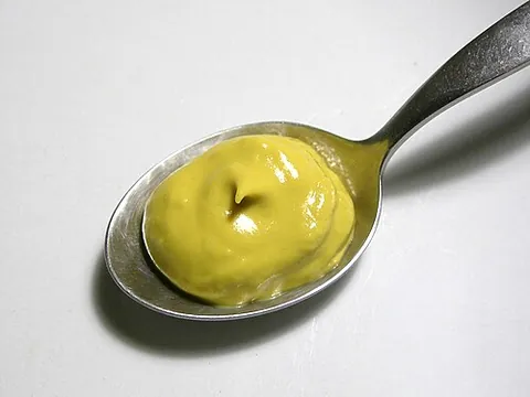 prepared mustard: a mustard sauce (a wet mustard preparation)