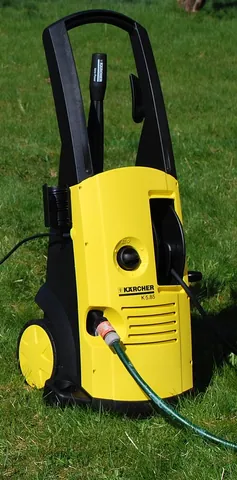 pressure washer: a mechanical device that uses a pump to generate a high-pressure stream of water (up to 5000 PSI -...