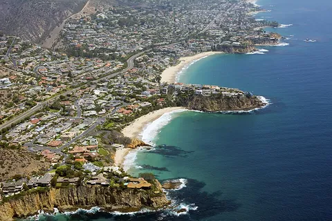 promontory: a high point of land extending into a body of water, headland; cliff