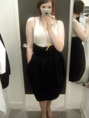 puffball skirt: a skirt whose hemline curves inwards and upwards, somewhat resembling a puffball mushroom