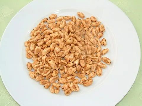 puffed wheat: a form of puffed grain made from wheat