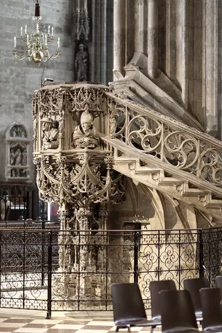 pulpit: a raised platform in a church, sometimes enclosed, where the minister or preacher stands when...