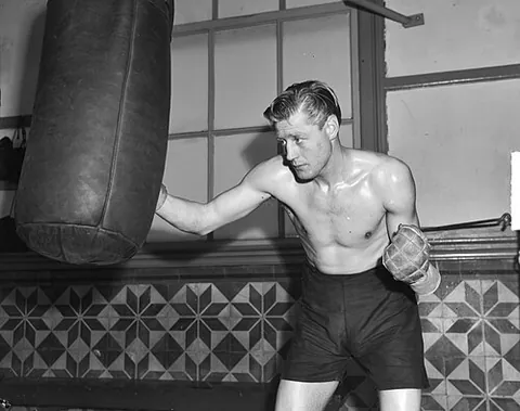 punching bag: a tough bag, usually cylindrical, filled with air, sand, or other material, often suspended so that...