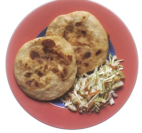 pupusa: a thick, hand-rolled maize tortilla