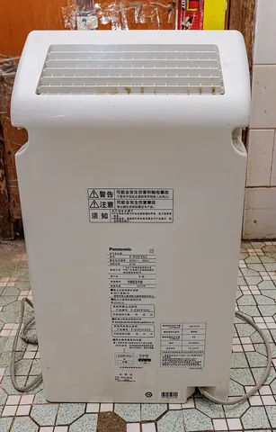 purifier: a person or device that purifies (by removing impurities)