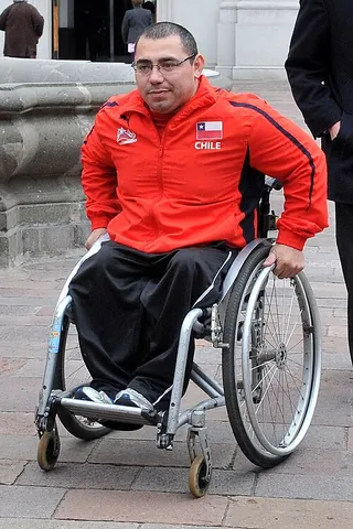 push rim: an extra rim attached to a wheel, as those of a wheelchair, used to impart motion to the wheel