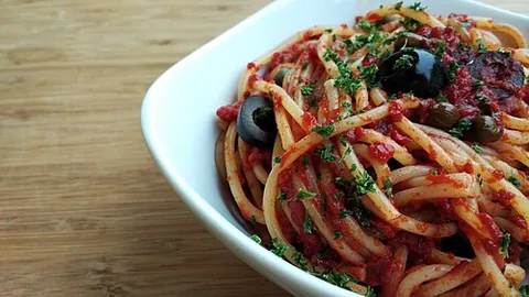 puttanesca: a cooking sauce made from tomato flavoured with garlic, anchovies, capers and olives, created in...