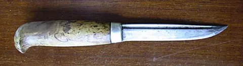 puukko: a type of sharp, pointed knife of Nordic heritage, with a short blade and flat back; normally worn...