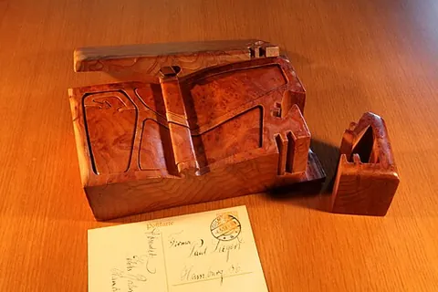 puzzle box: a box that cannot be opened by the usual obvious means, and therefore challenges a person to find...