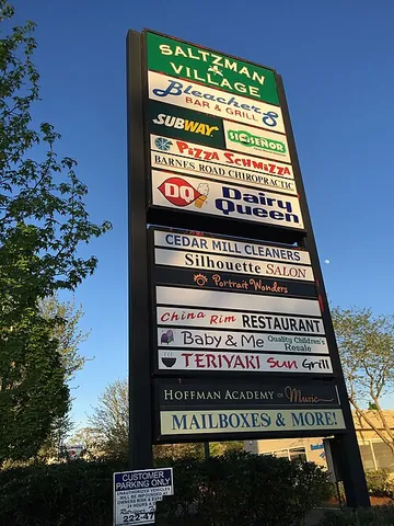 pylon sign: a tall sign supported by one or more poles