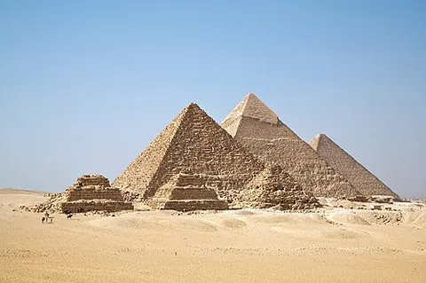 pyramid: an ancient massive construction with a square or rectangular base and four triangular sides meeting...