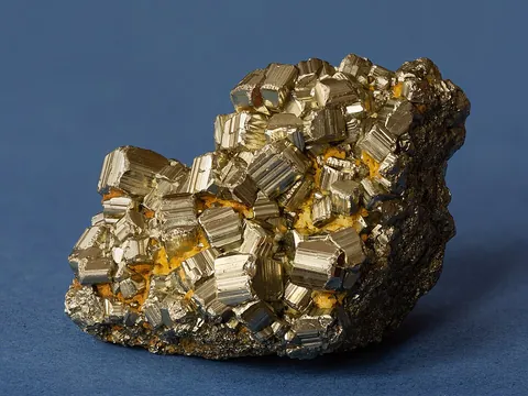 pyrite: the common mineral iron disulfide (FeS₂), of a pale brass-yellow color and brilliant metallic...