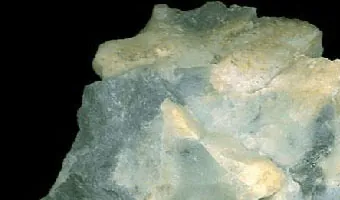 pyrophyllite: a soft, pale aluminosilicate mineral, somewhat resembling talc