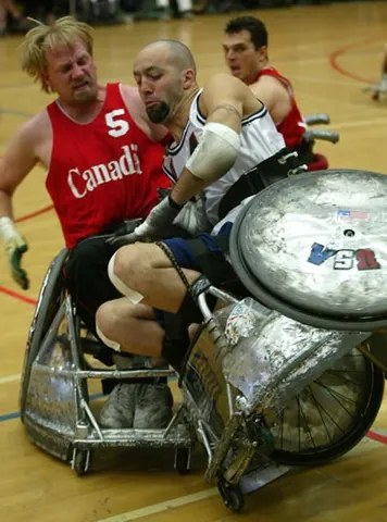 quad rugby: synonym of wheelchair rugby (US regional name and American English vernacular name)