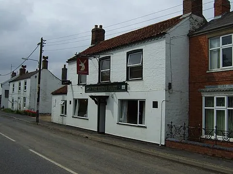 quadring: a village and civil parish in South Holland district, Lincolnshire, England (OS grid ref TF2233)