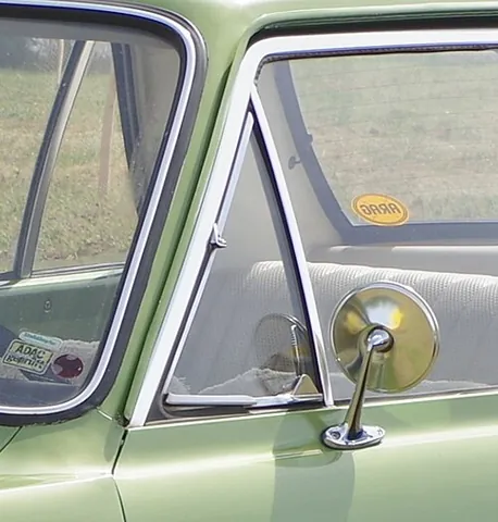 quarter glass: the small triangular-shaped side window on some vehicles, originally used as a vent