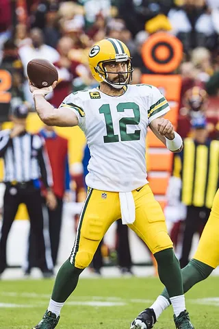 quarterback: an offensive back whose primary job is to pass the ball in a play