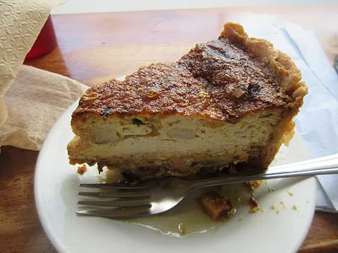 quiche: a pie made primarily of egg and cream, perhaps mixed with chopped meat or vegetables, in a pastry...