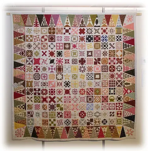 quilt: a bed covering consisting of two layers of fabric stitched together, with insulation between, often...