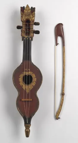 rabab: an Arabian stringed instrument, played by plucking or with a bow