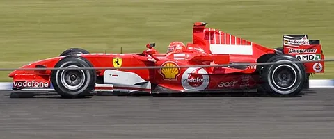 race car: a car designed for use on racetracks in motor racing events