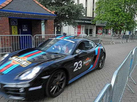racing stripe: vertical or longitudinal bands painted on vehicles to evoke speed and high performance