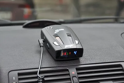 radar detector: a device used by motorists, often mounted on the car's dashboard, to evade punishment for speeding;...