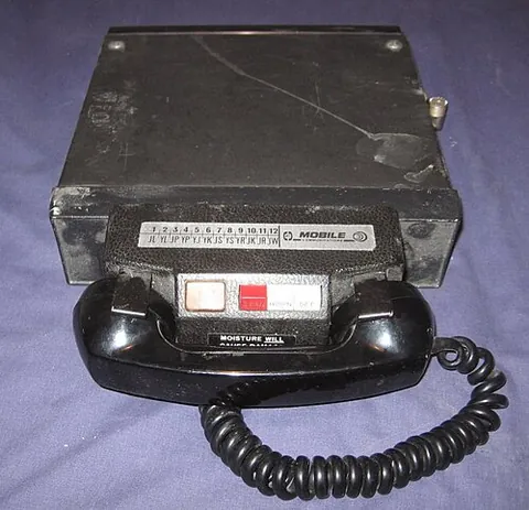 radiotelephone: a device that allows two-way communication by means of a radio